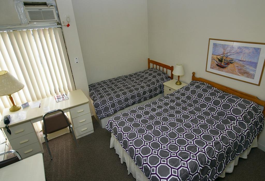 Zimmer mit Doppel- und Einzelbett
