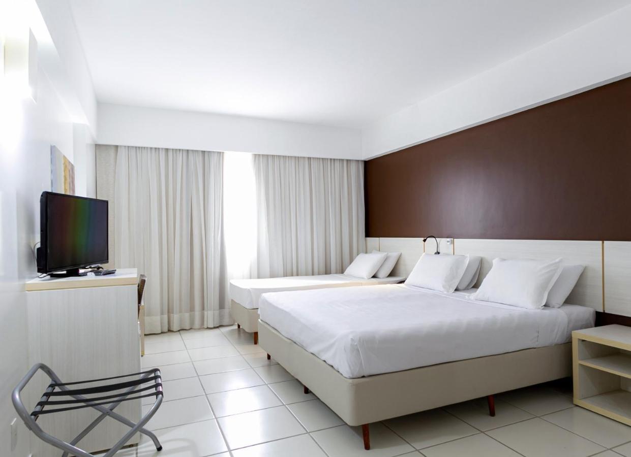 Deluxe Zimmer mit 1 Queensize-Bett und 1 Einzelbett