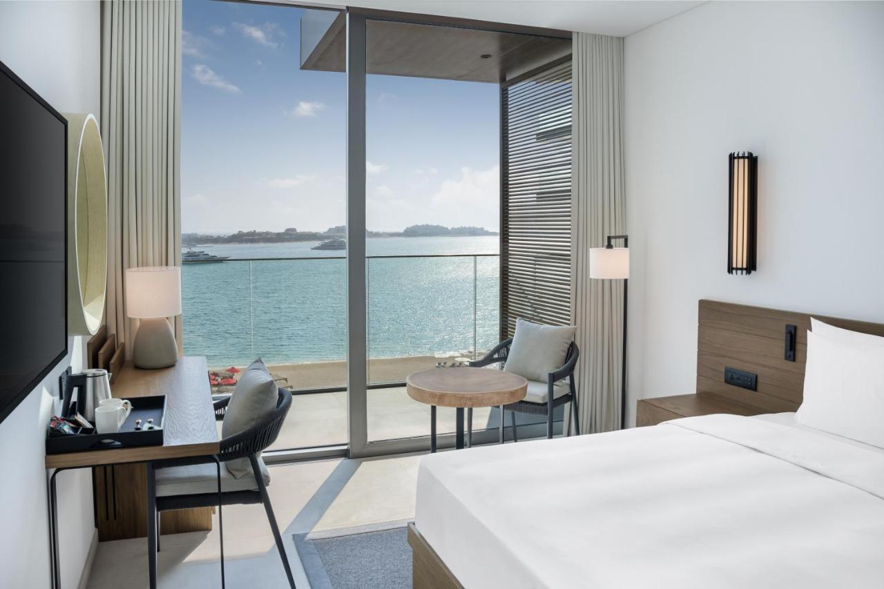 Habitación Premium con vistas a la piscina y al mar