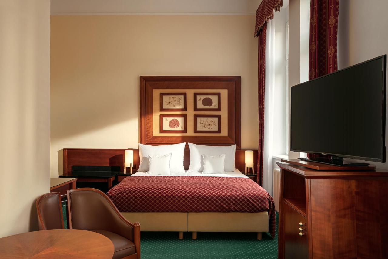 Comfort Dreibettzimmer mit Zugang zum Wellnessbereich