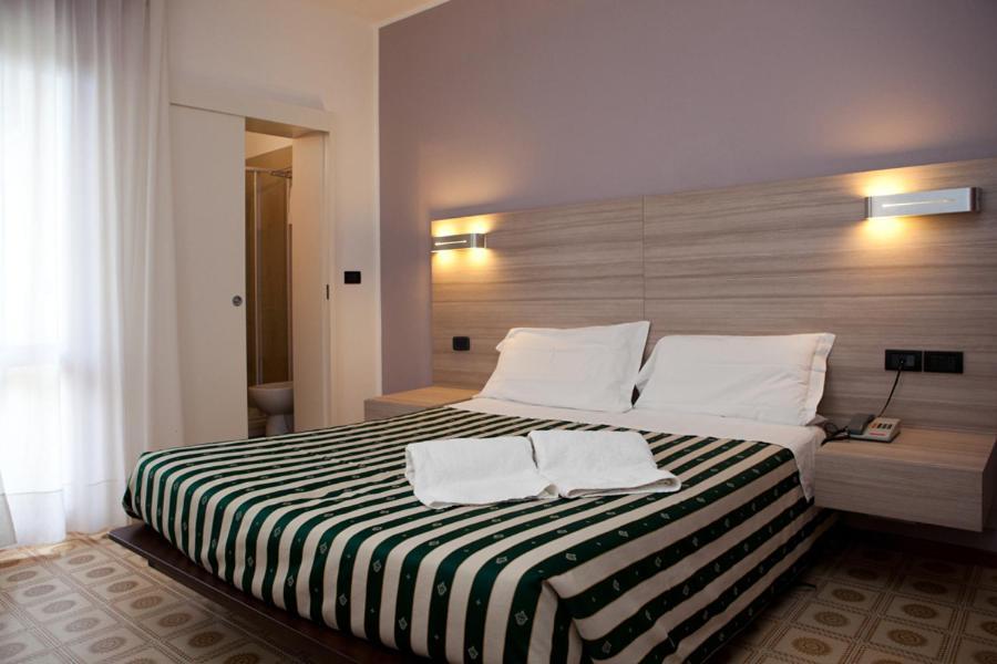 Dreibettzimmer mit Balkon