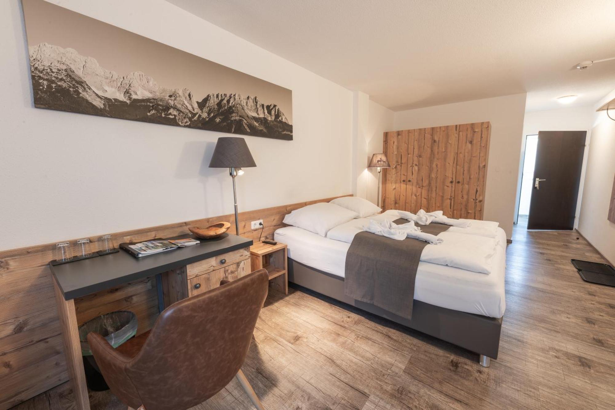 Dreibettzimmer mit Balkon