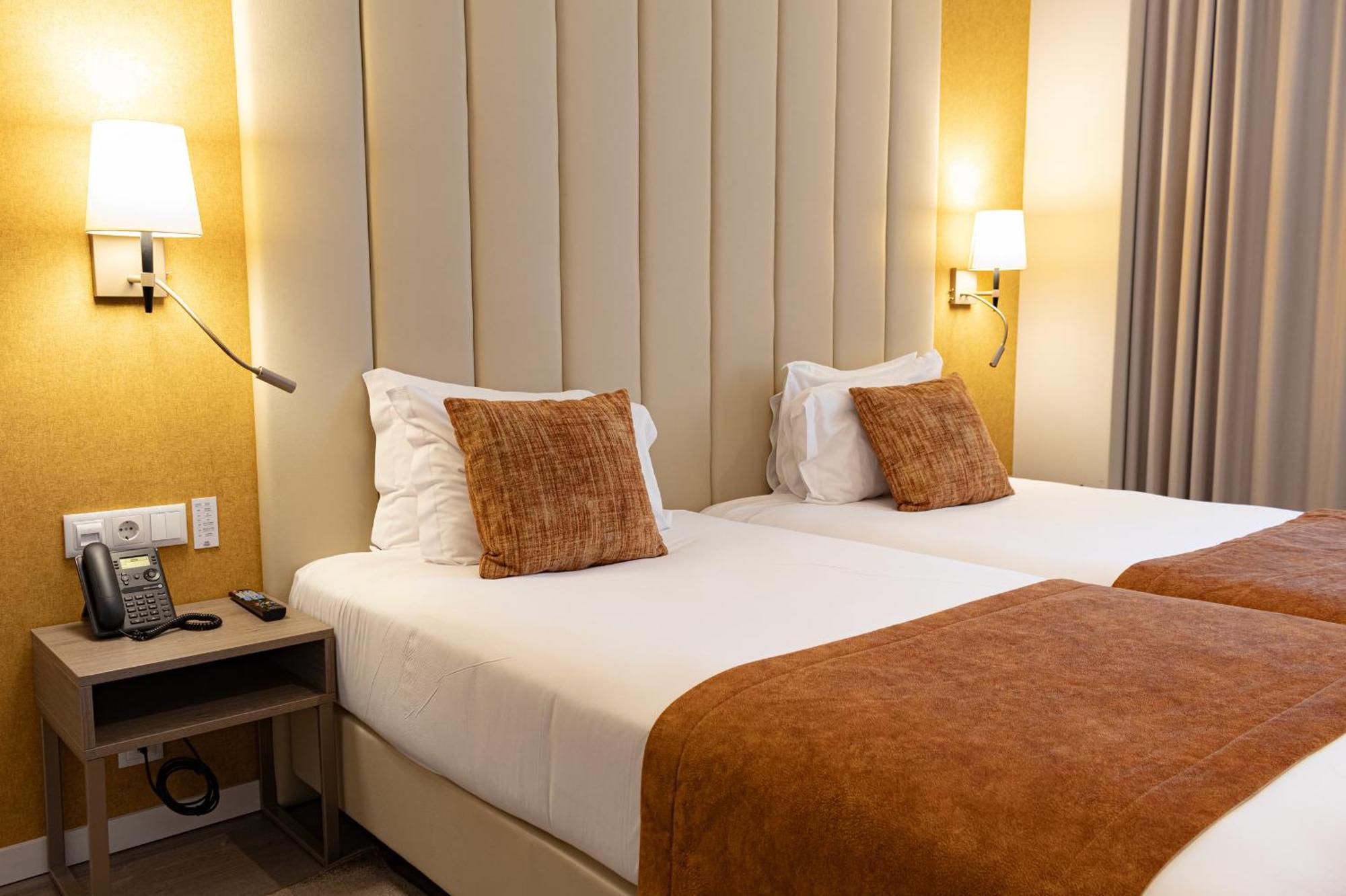 Quarto Standard com Cama de Casal ou 2 de Solteiro