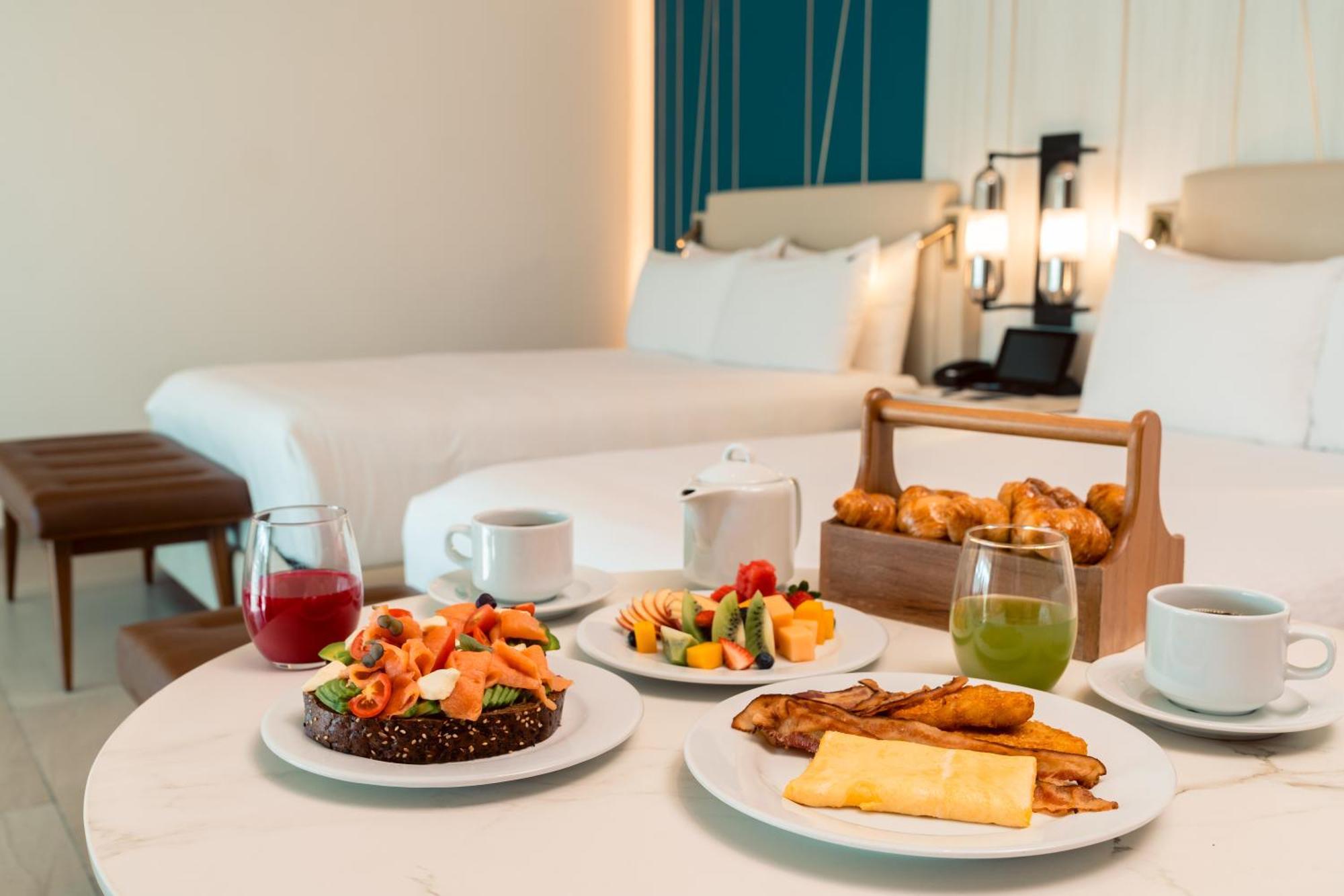 Suite Caribbean Sand con camas dobles y sofá