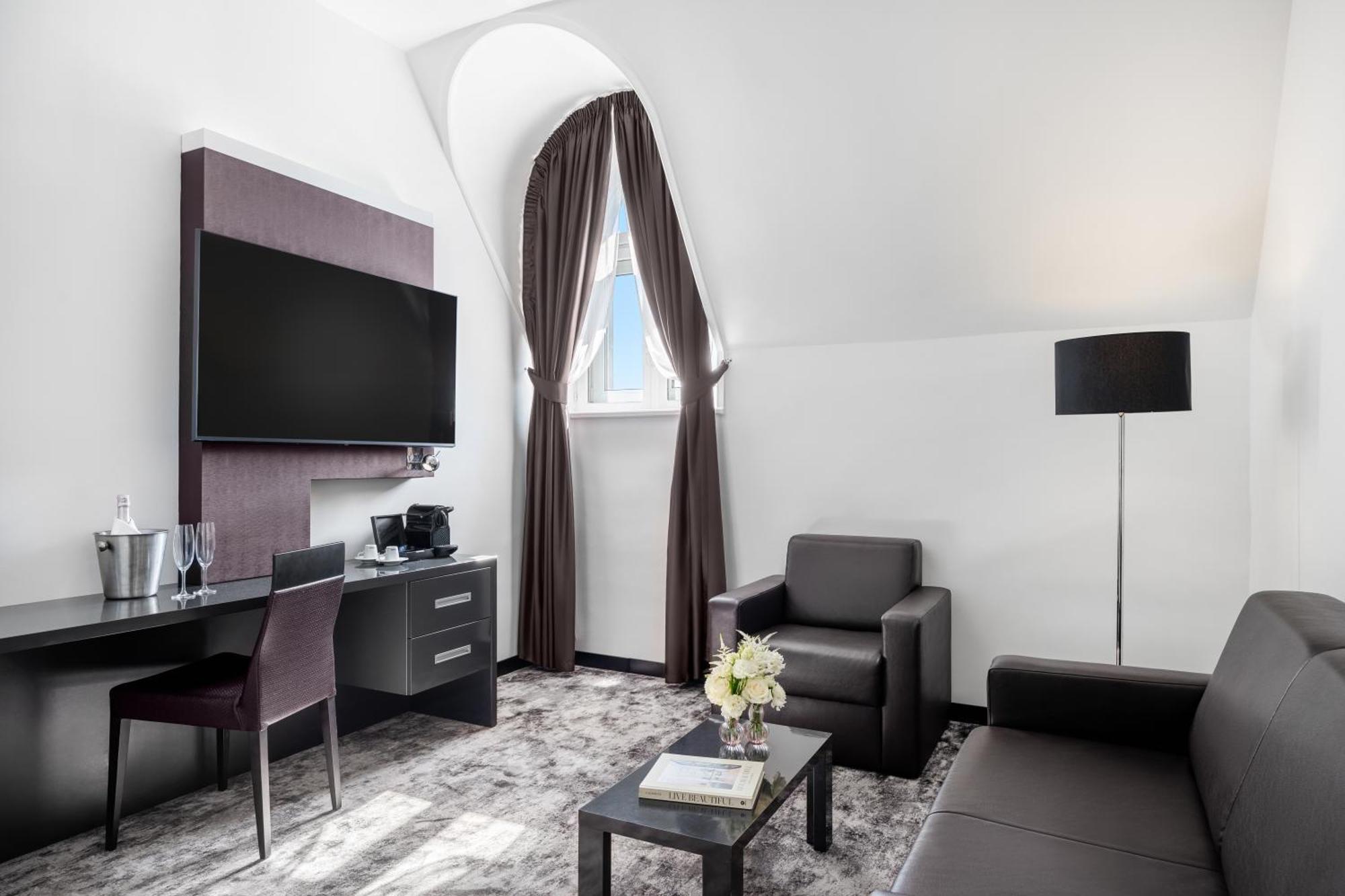 Junior Suite met 1 Kingsize Bed en Bank
