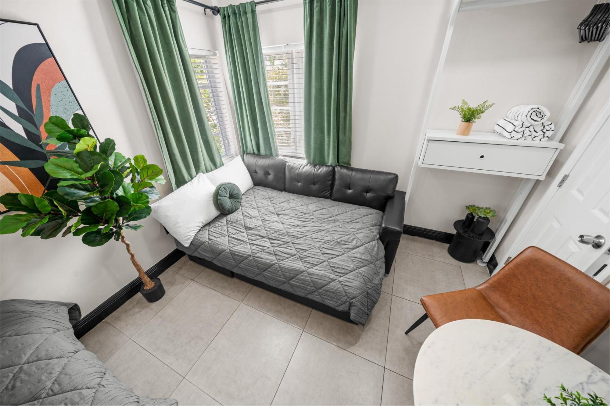 Deluxe Corner Queen Studio Kitchenette Sofa Bed