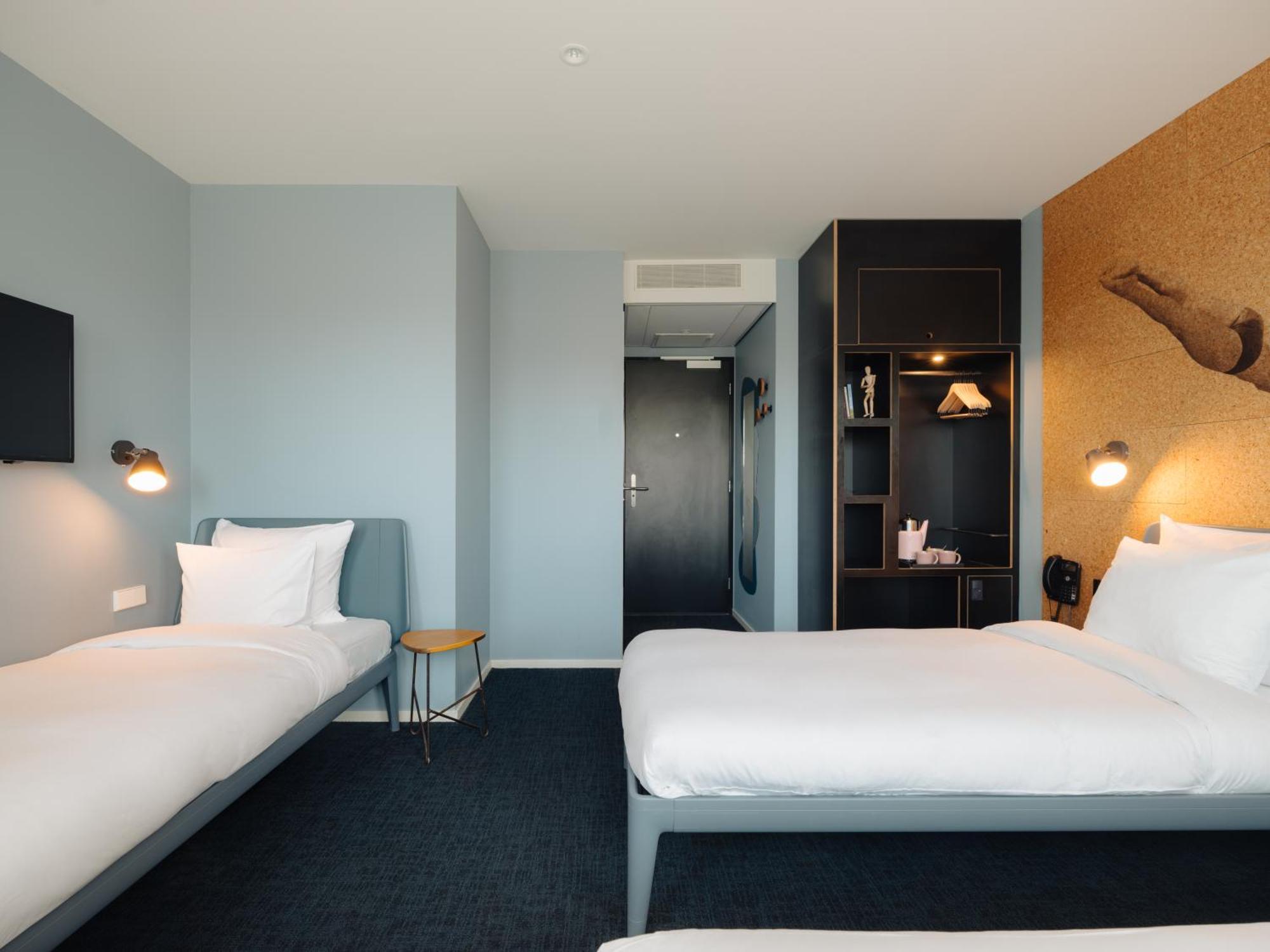 Umweltfreundliches Dreibettzimmer