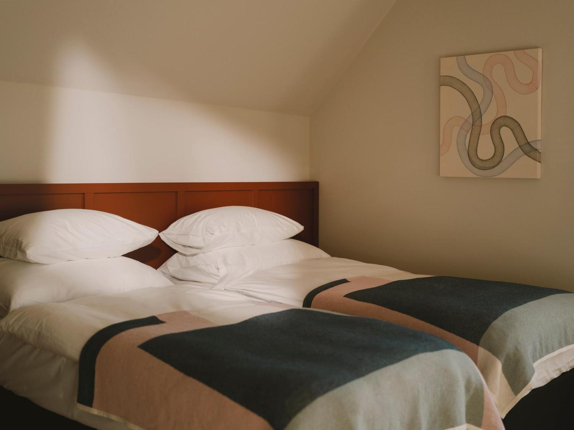 Doppel- oder Zweibettzimmer