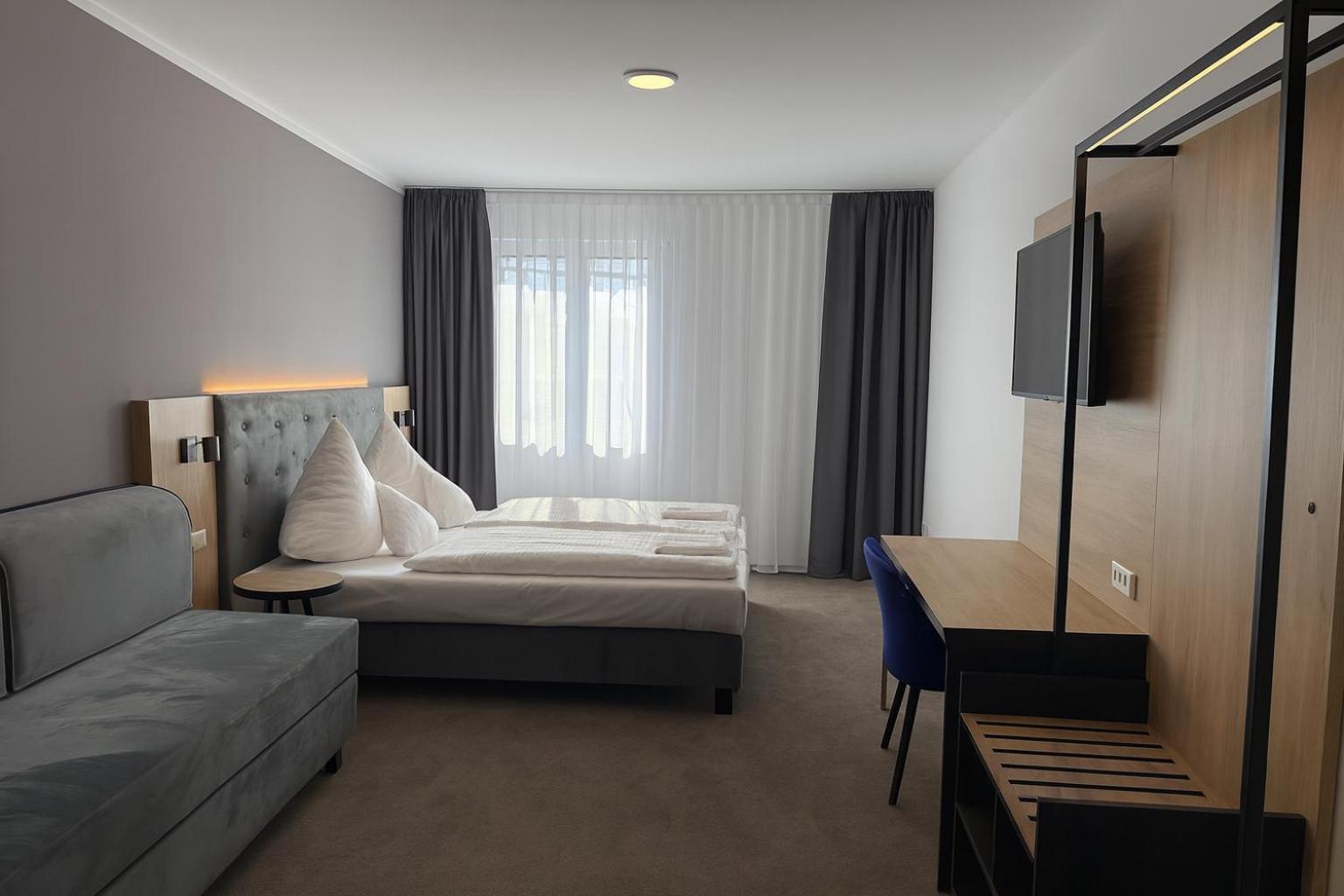 Deluxe Doppelzimmer mit Zustellbett