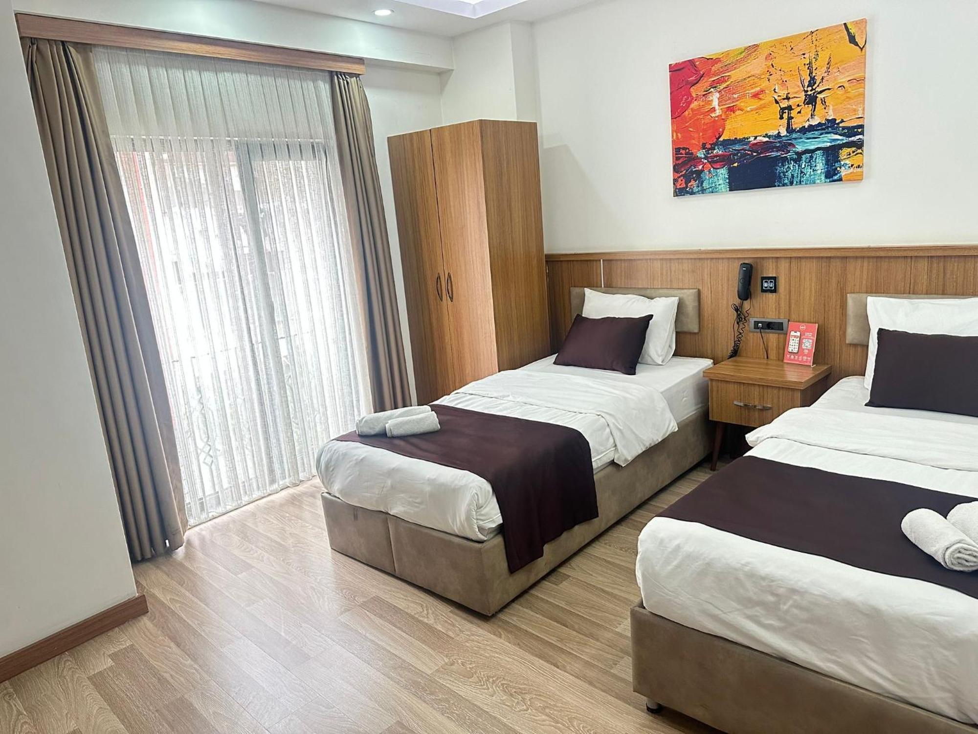 Deluxe Dreibettzimmer