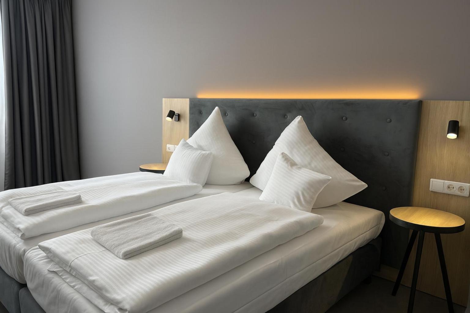 Doppel- oder Zweibettzimmer