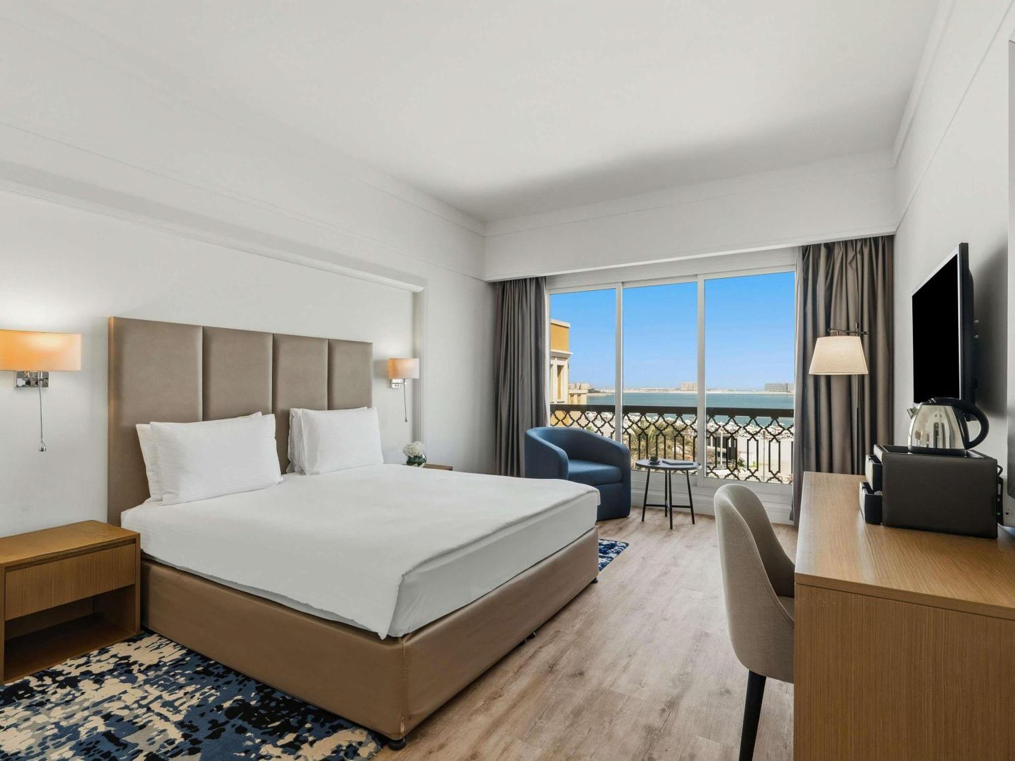 Quarto Deluxe com Vista da Piscina ou do Mar