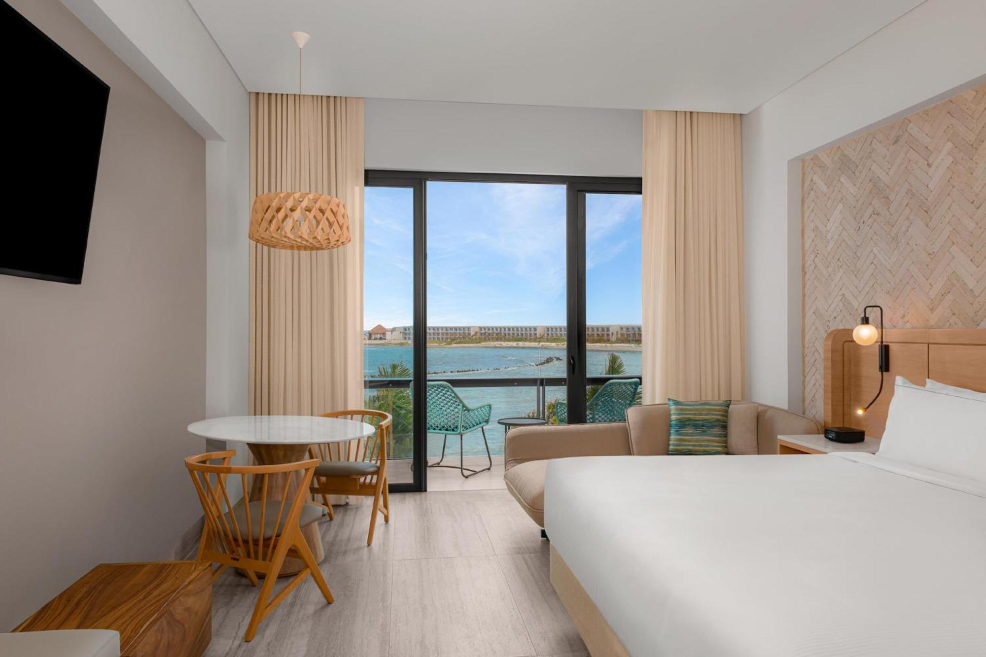 Quarto com Cama King-size e Vista do Mar