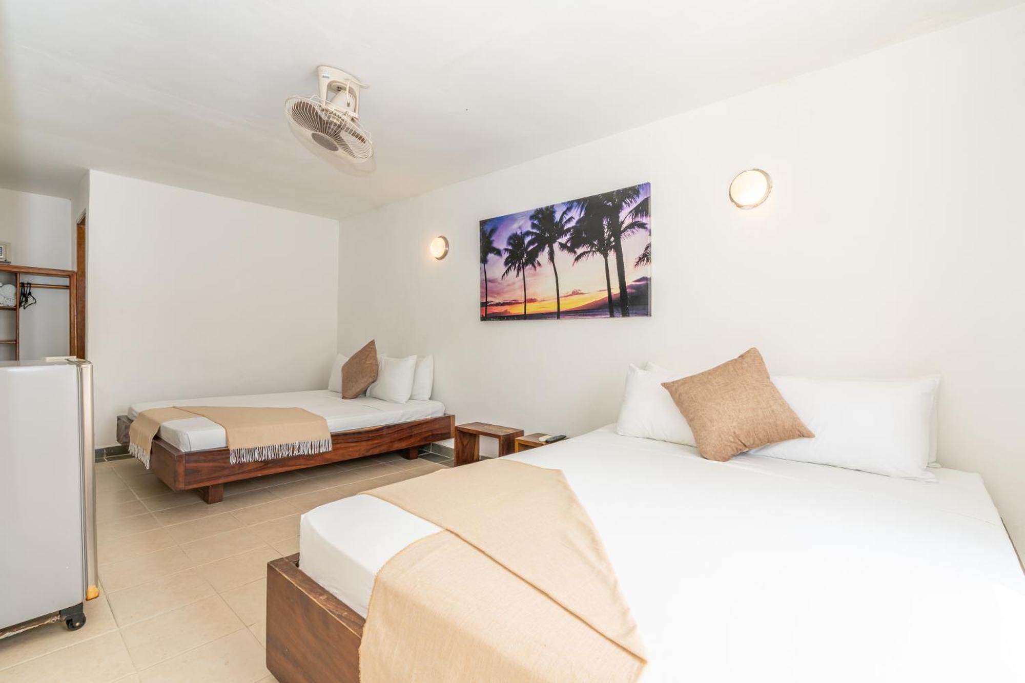 Habitación Cuádruple - vistas al jardín