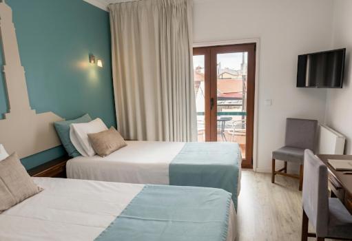 Quarto com 2 Camas de Solteiro e Varanda
