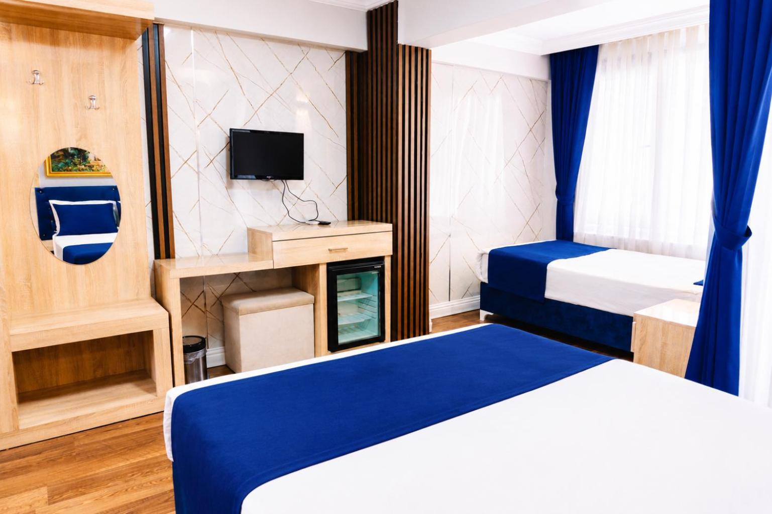 Deluxe Triple Room