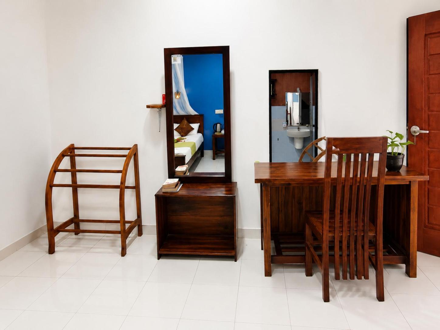 Chambre Triple avec Salle de Bains Privative