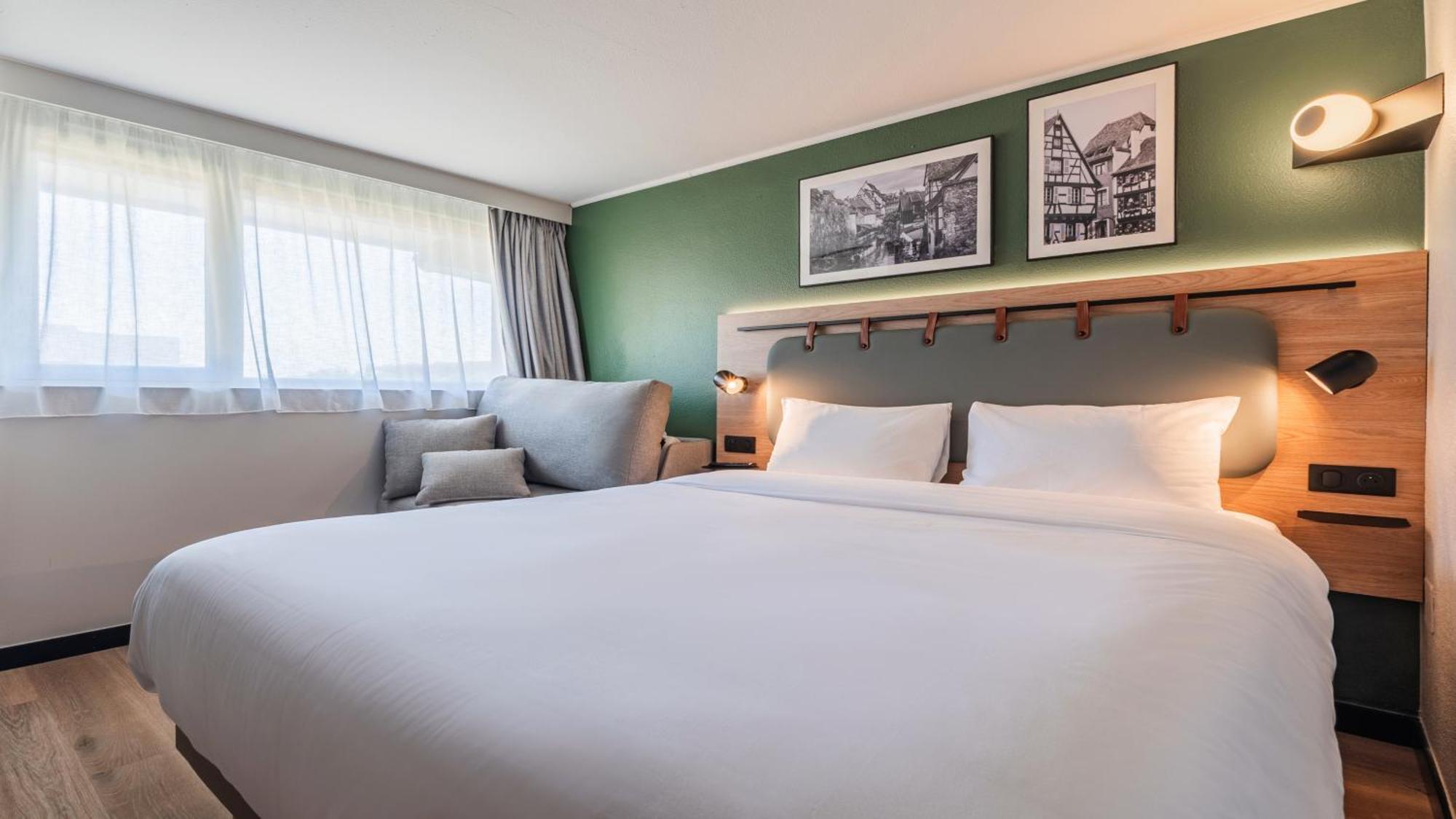 Standard Room One Queen Bed One Sofa Bed