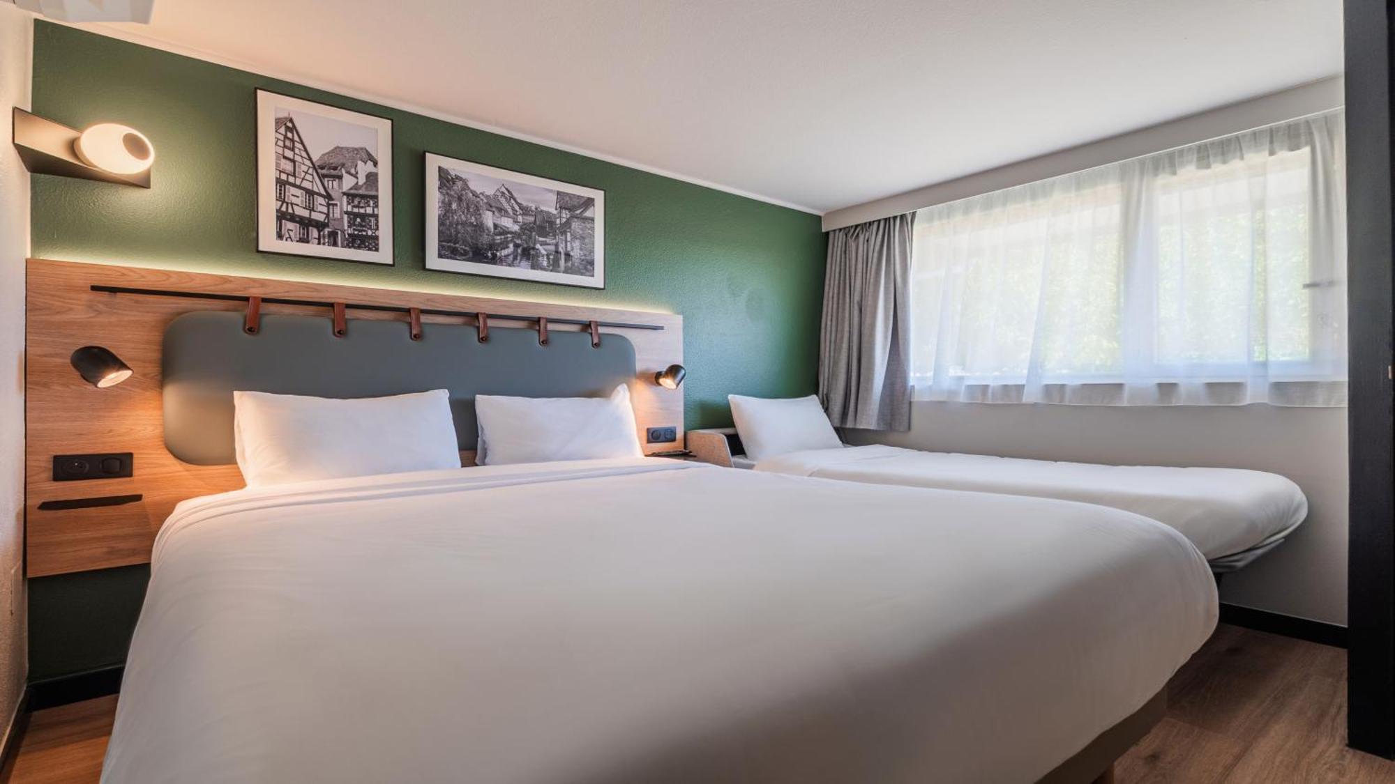 Standard Room One Queen Bed One Sofa Bed