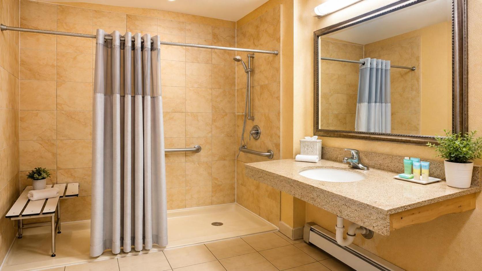 Quarto com Cama Queen-size e Banheiro Acessível para Hóspedes com Mobilidade Reduzida