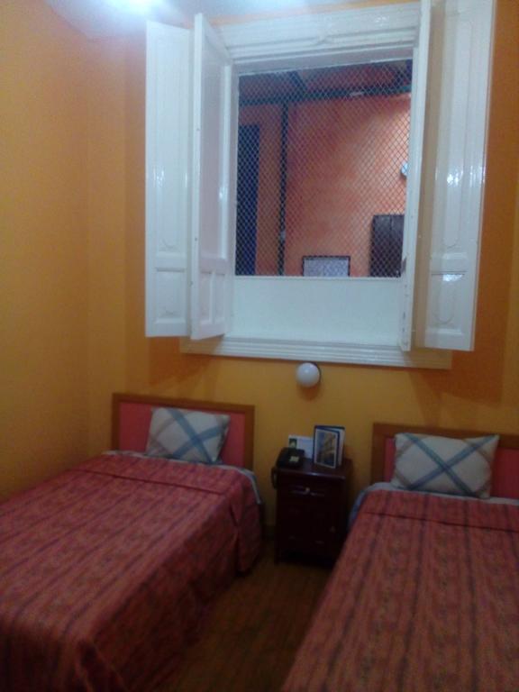 Quarto Duplo com Banheiro Compartilhado