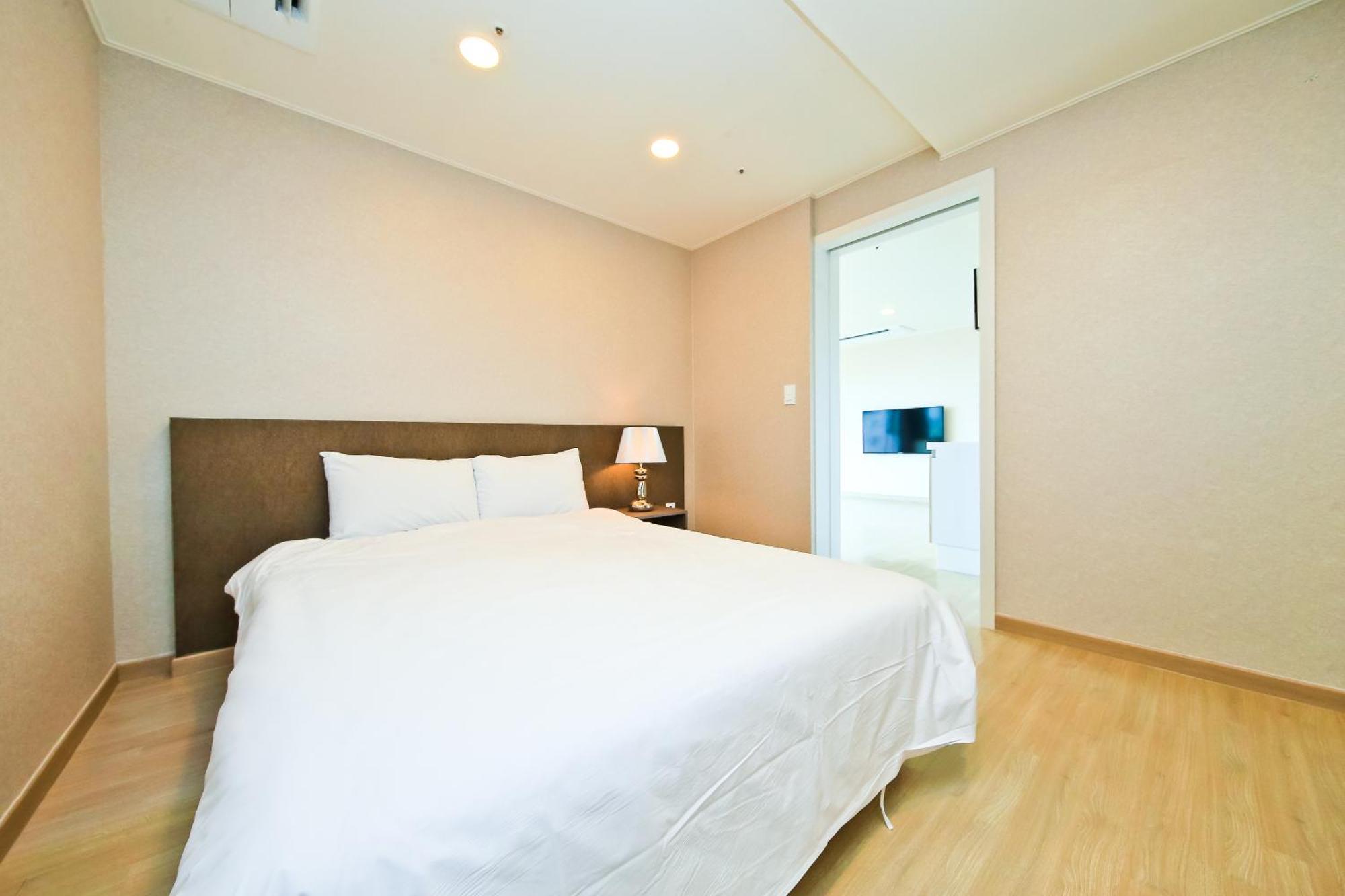 Chambre Double Deluxe - Vue Latérale sur Mer