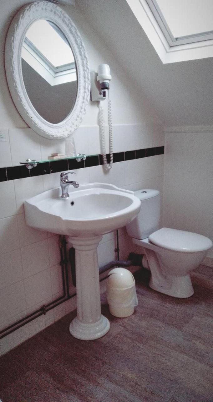 Chambre Triple avec Douche - 2 Lits